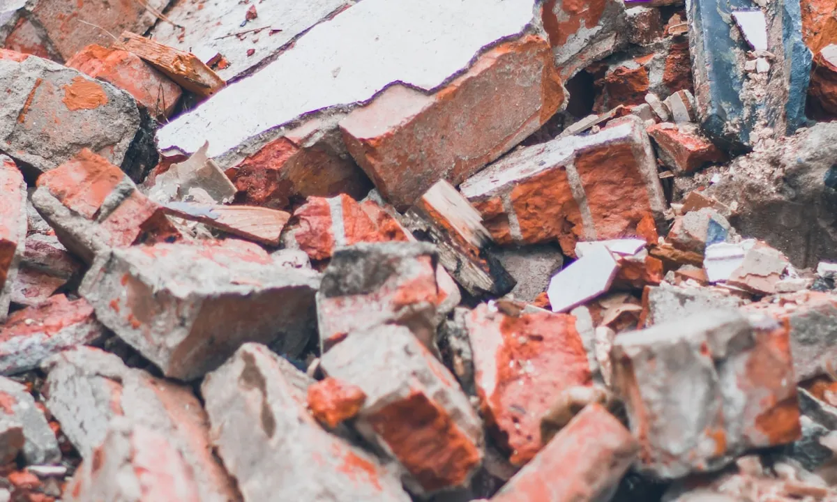Broken concrete and masonry debris sorted for hauling